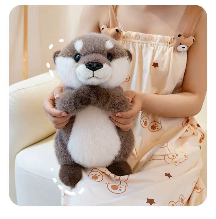 Cuddly Otter Plush Magnet Hand