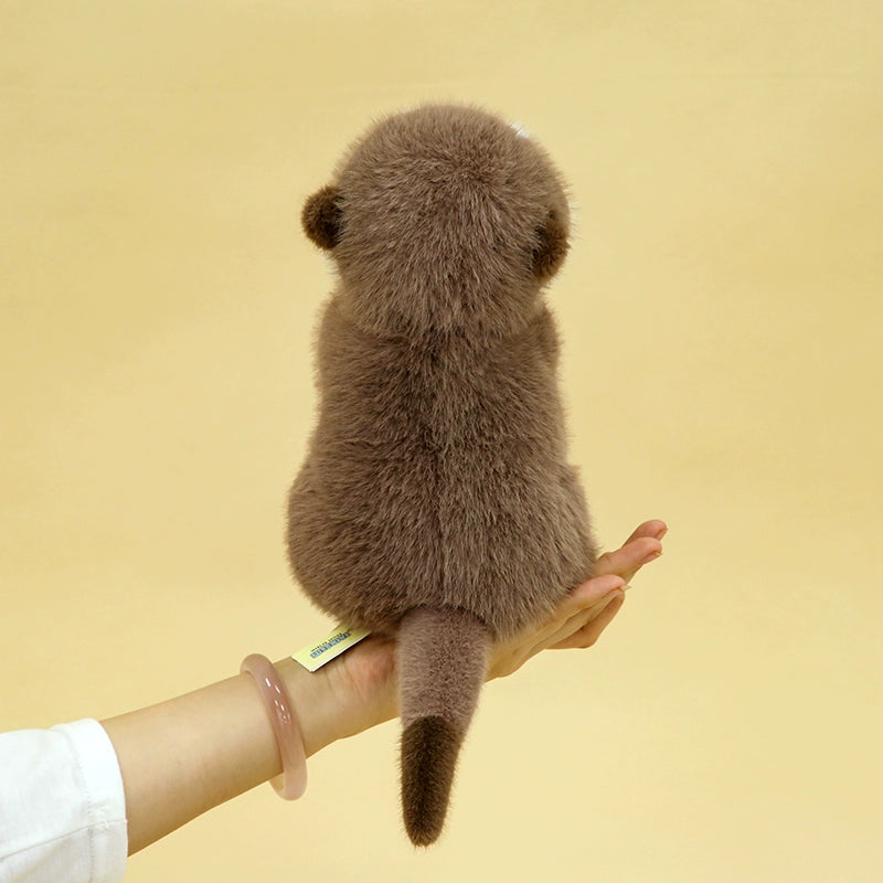Cuddly Otter Plush Magnet Hand