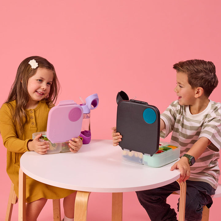 Children using Night Vision and pink lunch boxes