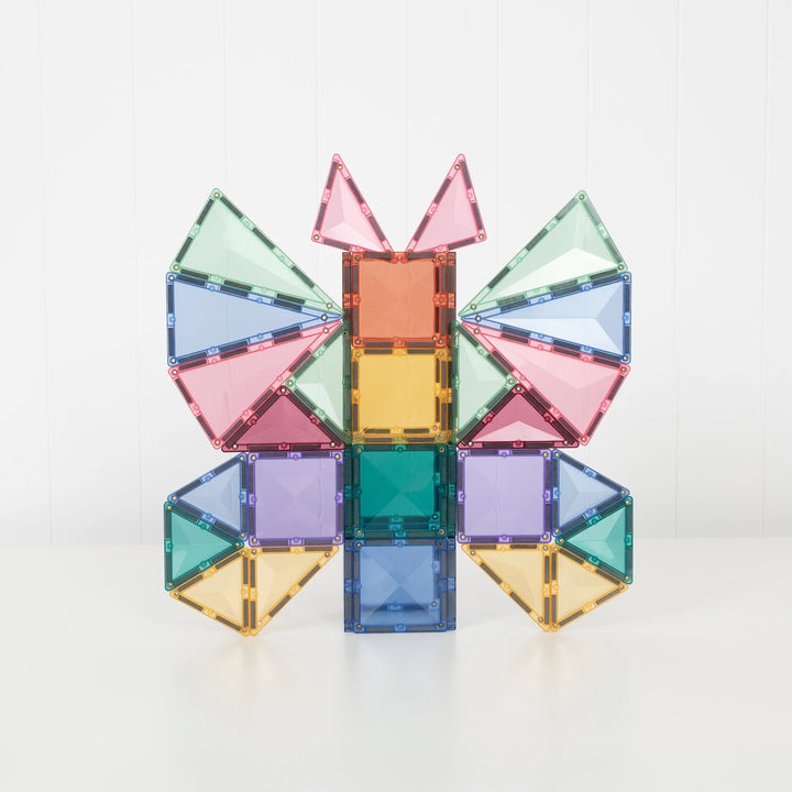 Butterfly design built with pastel square and triangle magnetic tiles