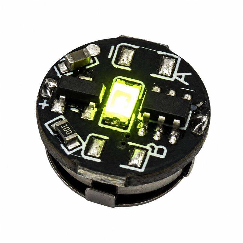 Yellow green magnetic LED module for model kits, 11 mm diameter and 5.4 mm high, on a solid white background