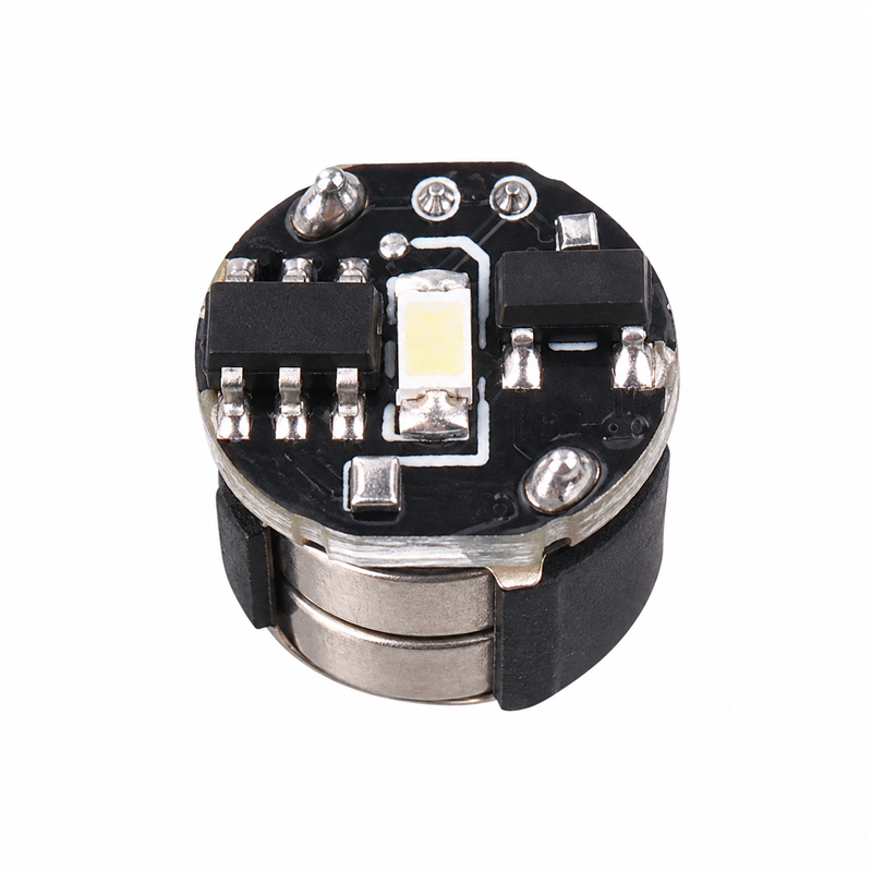 Mini magnetic LED module, 7.5 mm diameter and approximately 7 mm high, on a white background